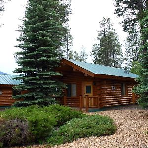 Silverwolf Log Chalets Coram Exterior photo